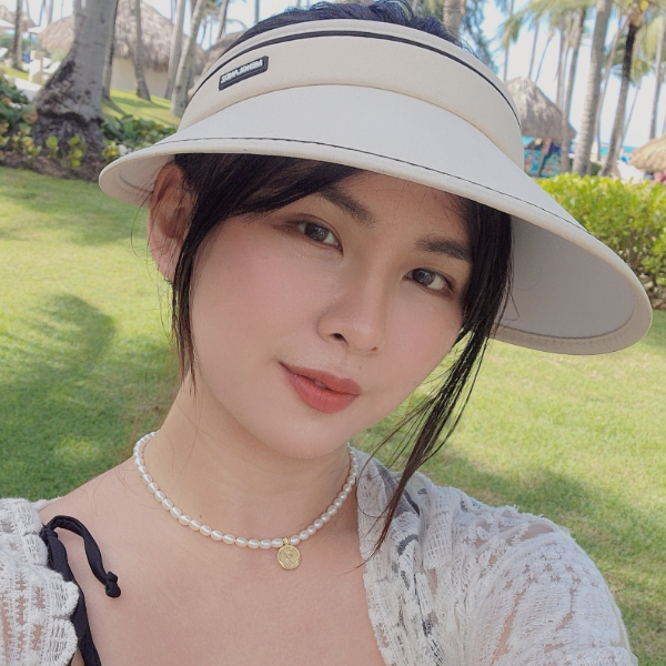 Natasha Xinyu Huang Cheng